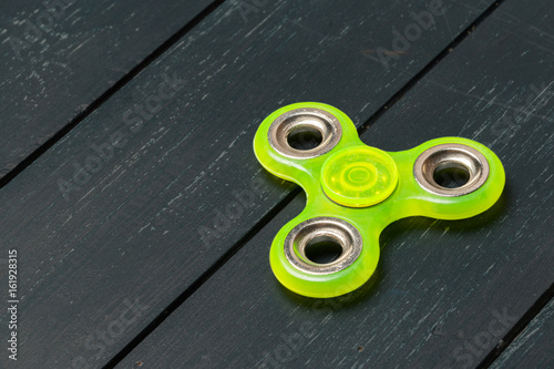 spinner on a wooden table. close up