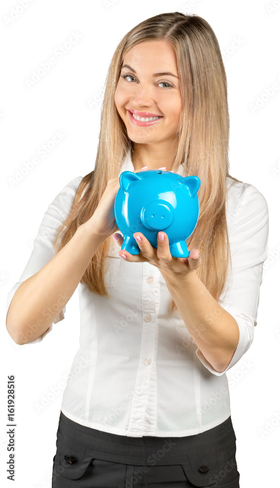 Happy young woman with a money box isolated on white Happy young woman with a money box isolated on white