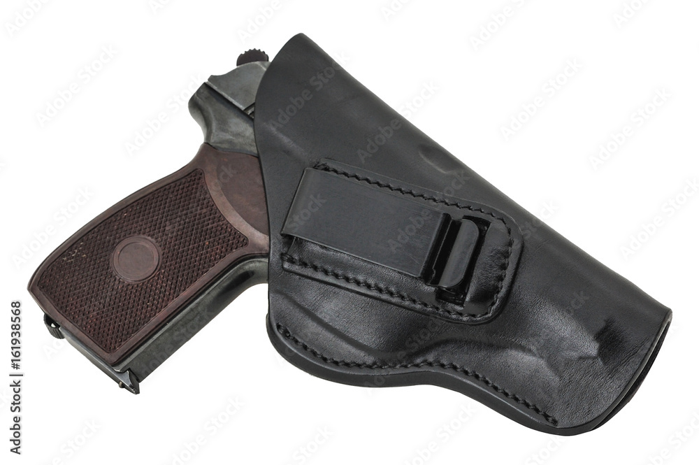 Molded leather holster with handgun. Isolated Molded leather holster with handgun. Isolated