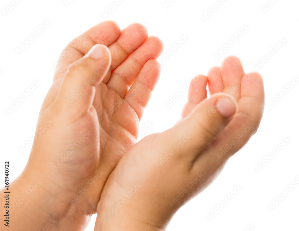 Two children's hand on a white background Two children's hand on a white background