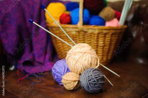 color knitting and balls in the basket