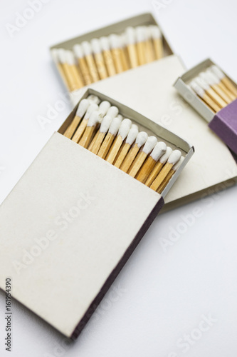 Closeup of matchboxes, isolated on white