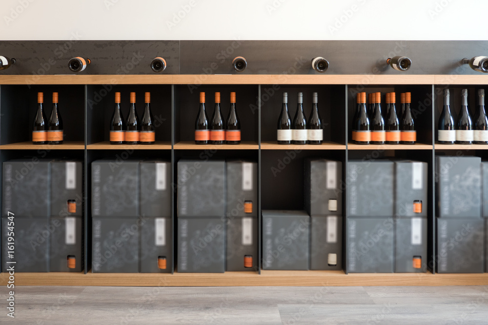 Wine and Champagne Bottles in Modern Wine Shop, Shelves, Winery Display Wine and Champagne Bottles in Modern Wine Shop, Shelves, Winery Display