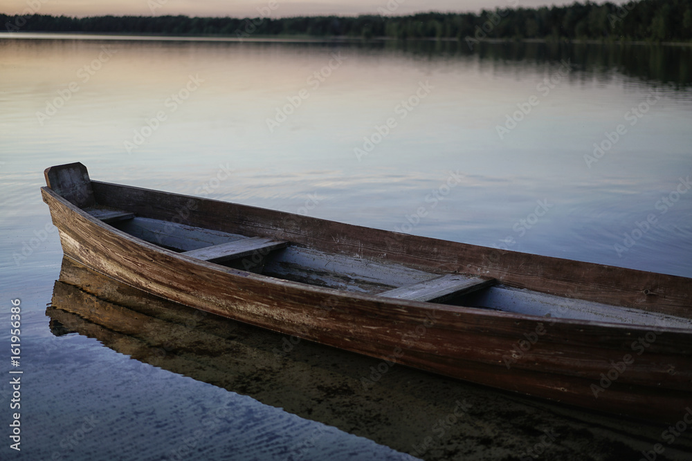 Landscape with a lake and boats.