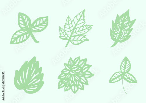 Vector icon of autumn leaves against green background