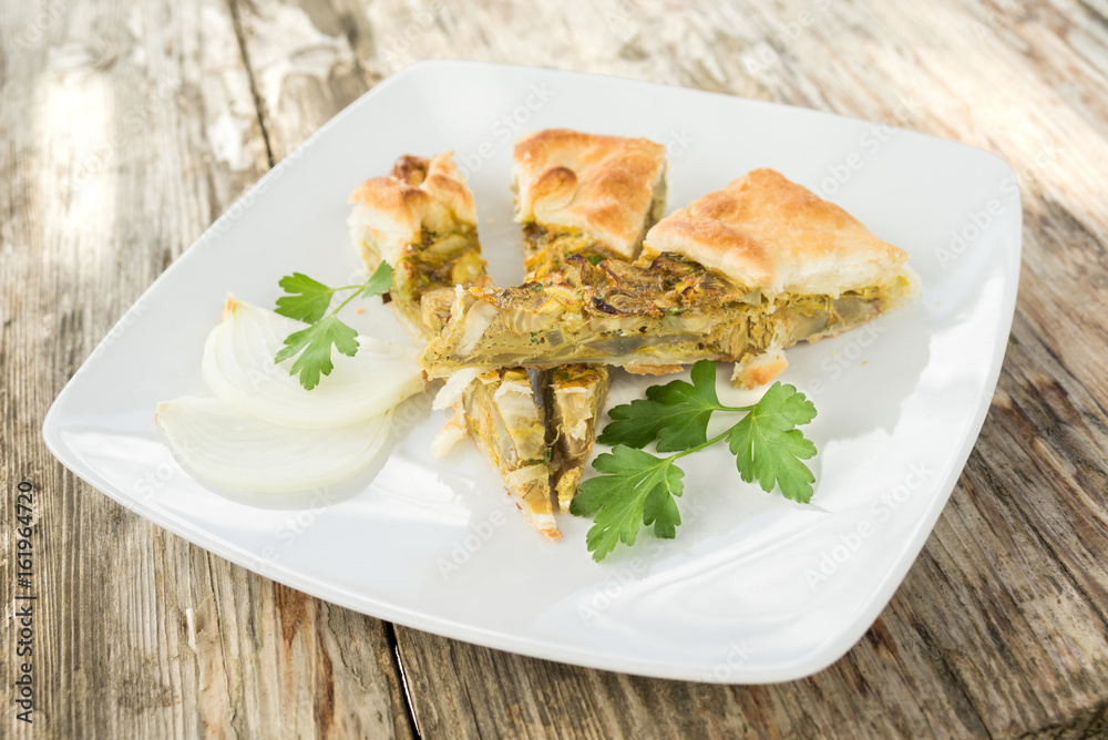 Salty pie with egg, artichoke and onion Salty pie with egg, artichoke and onion
