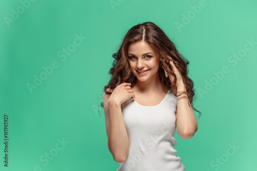 The young woman's portrait with happy emotions
