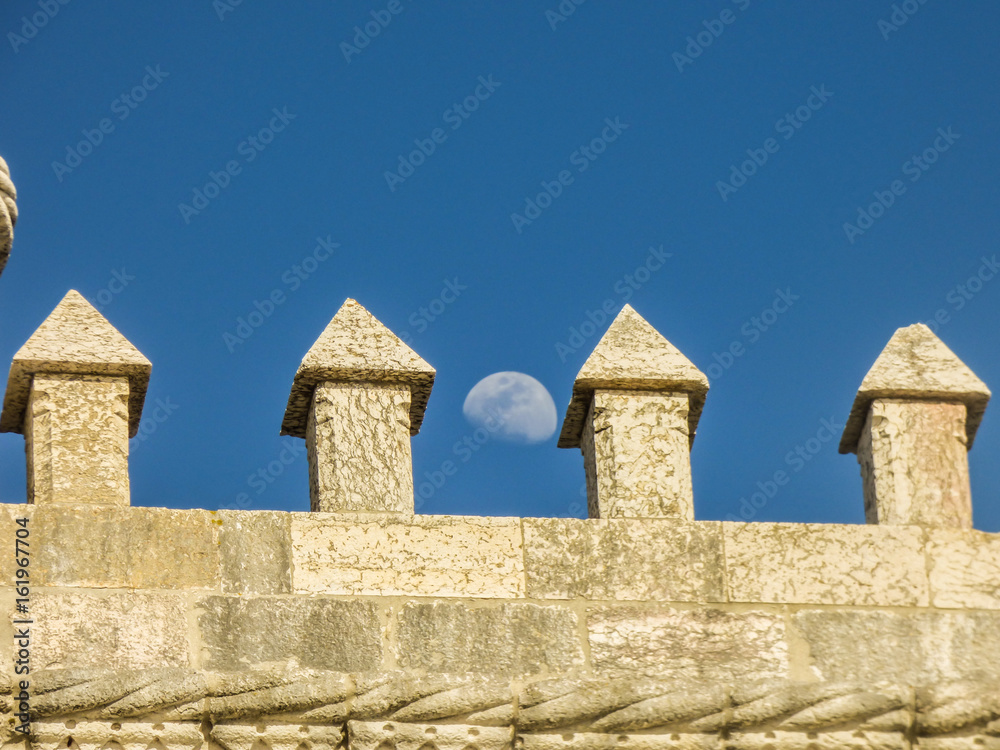 Belem tower details and the moon