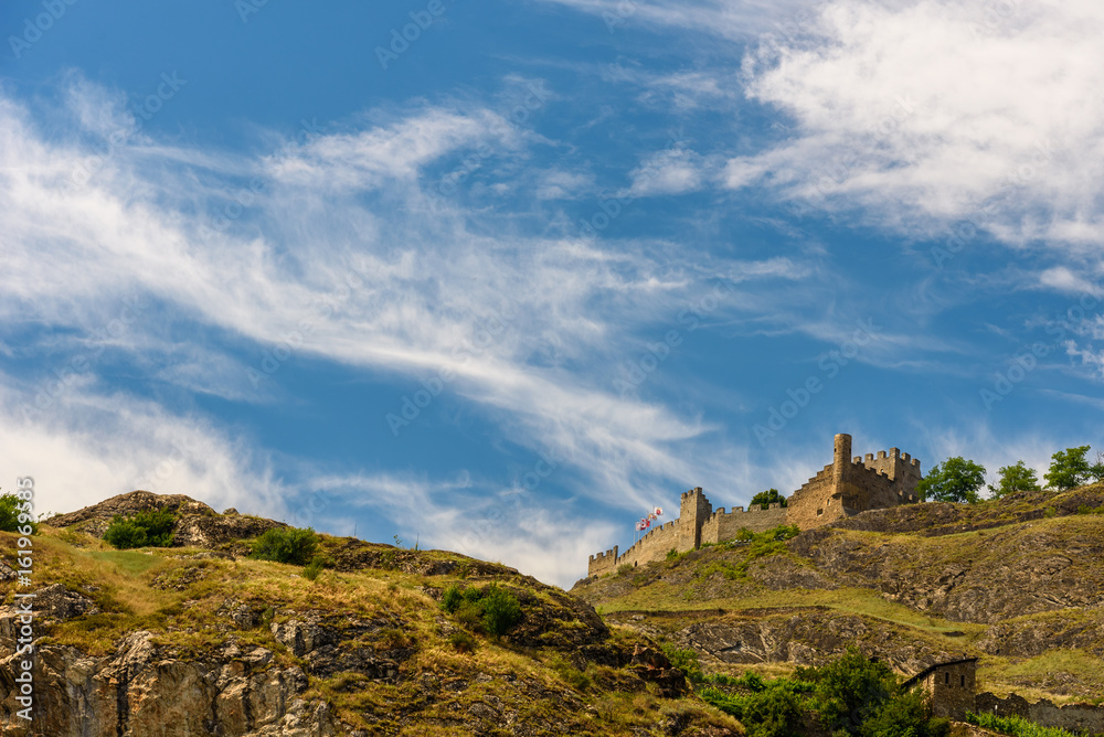 Ruins of a castle in Switzerland against blue sky