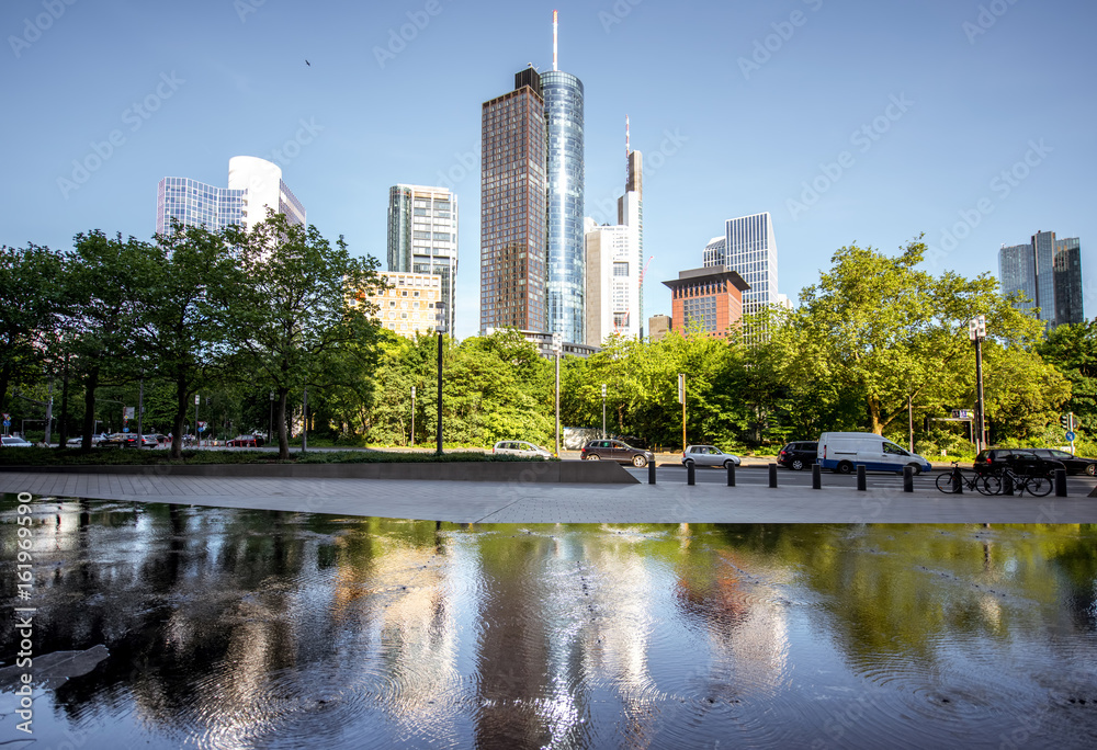 View on the financial district with reflection in Frankfurt city, Germany View on the financial district with reflection in Frankfurt city, Germany