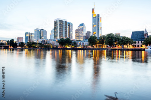 Beautiful cityscape view on the illuminated skyscrapers during the twilight in Frankfurt  Germany