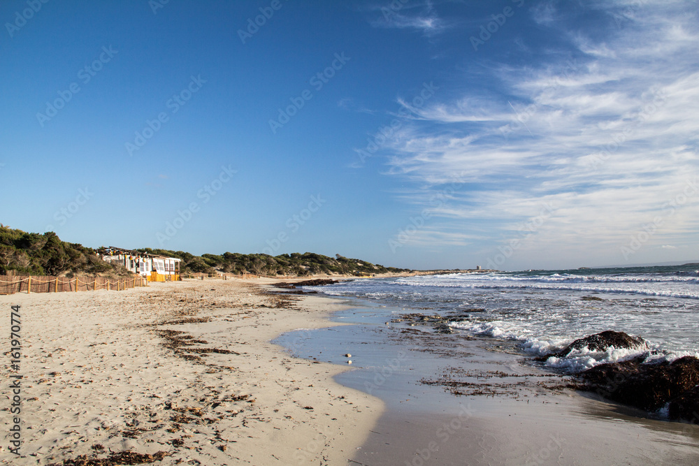 View along Salinas Beach Ibiza on sunny Winter Day with light Cirrus Clouds over the Sea View along Salinas Beach Ibiza on sunny Winter Day with light Cirrus Clouds over the Sea