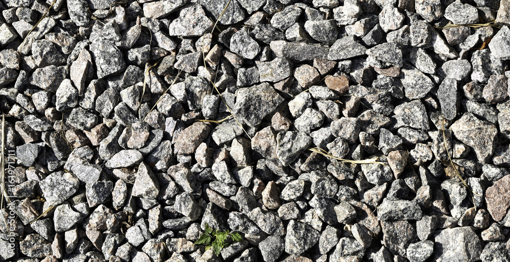 A detailed generic view of typical gravel on the road A detailed generic view of typical gravel on the road