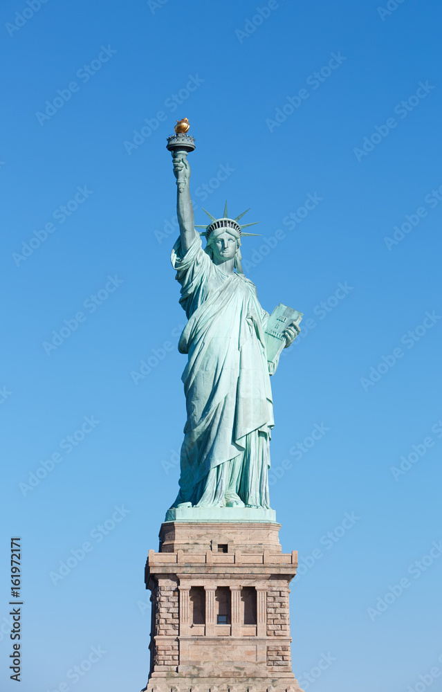 Statue of Liberty with pedestal in New York, clear blue sky in a sunny day, clipping path