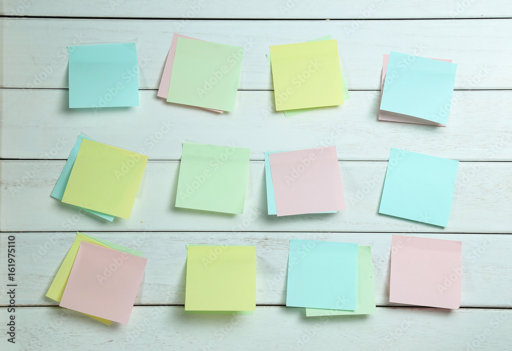 notepapers sticked on white wooden board