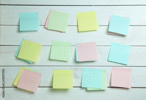 notepapers sticked on white wooden board