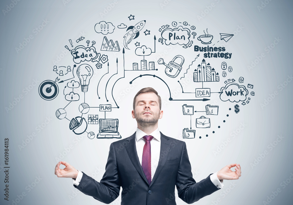 Meditating businessman, business strategy Meditating businessman, business strategy