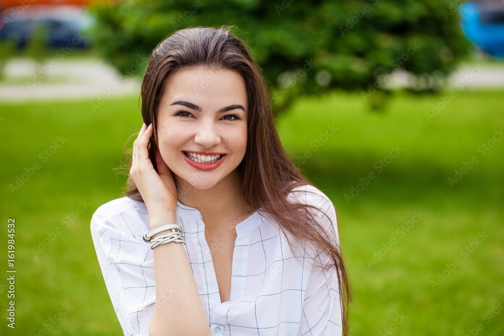 Portrait of beautiful young happy woman