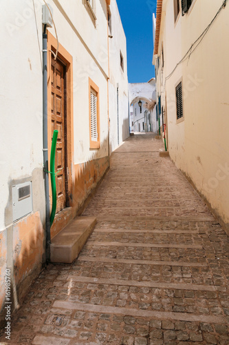 narrow pedestrian street in old town of Albufeira