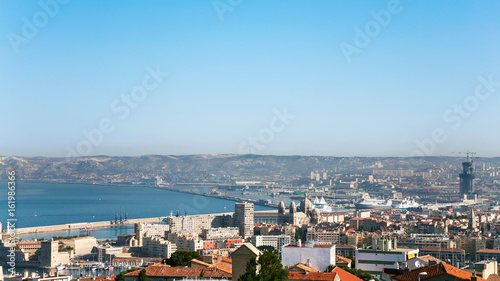 view of Marseilles city and port under blue sky © vvoe