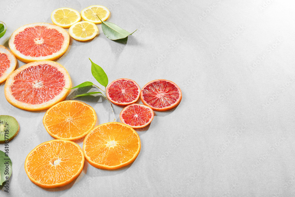 Citrus slices on light background Citrus slices on light background