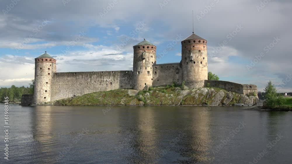 June cloudy evening at the fortress of Olavinlinna. Savonlinna, Finland June cloudy evening at the fortress of Olavinlinna. Savonlinna, Finland