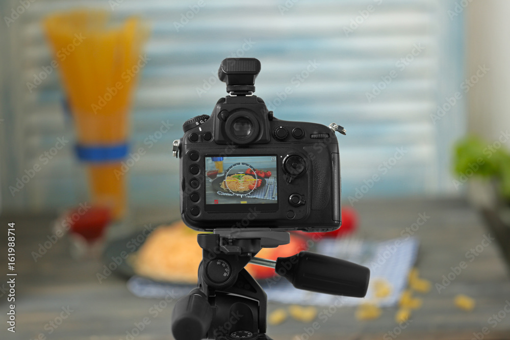 Photo of food on camera display while shooting - obrazy, fototapety, plakaty 