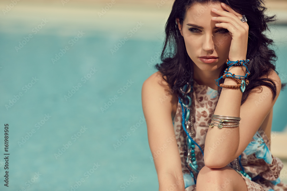 fashion woman on summer vacation relaxing at luxury resort spa poolside fashion woman on summer vacation relaxing at luxury resort spa poolside
