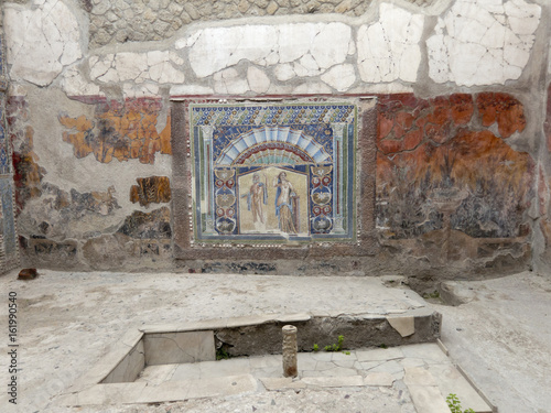 Interior of a room in a Roman villa with a wall mosaic, Herculaneum