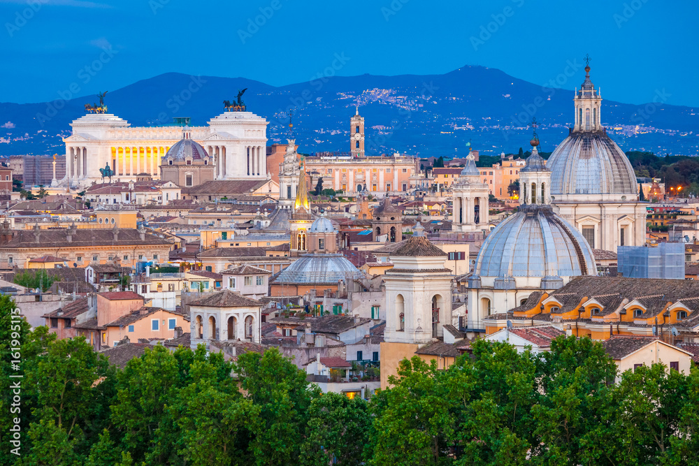 Twilight on Tiber river with cityscape of Rome,Italy. Skyline of Rome, with its best architecture and landmarks. Rome panorama is a top romantic choice at sunset.