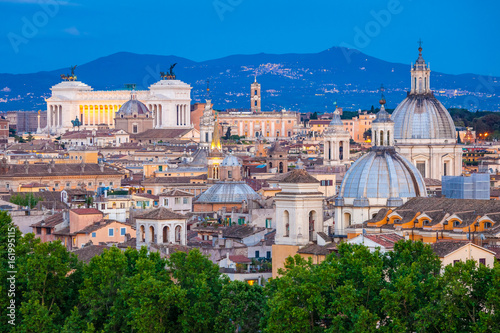 Twilight on Tiber river with cityscape of Rome,Italy. Skyline of Rome, with its best architecture and landmarks. Rome panorama is a top romantic choice at sunset.