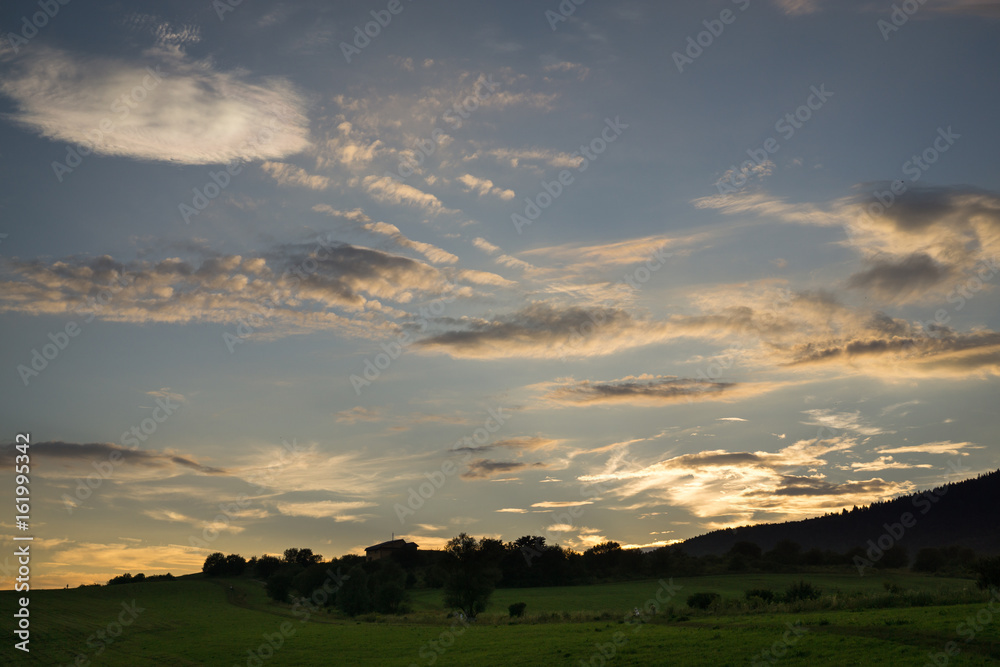 Sunrise and sunset over the buildings in the Zilina city. Slovakia