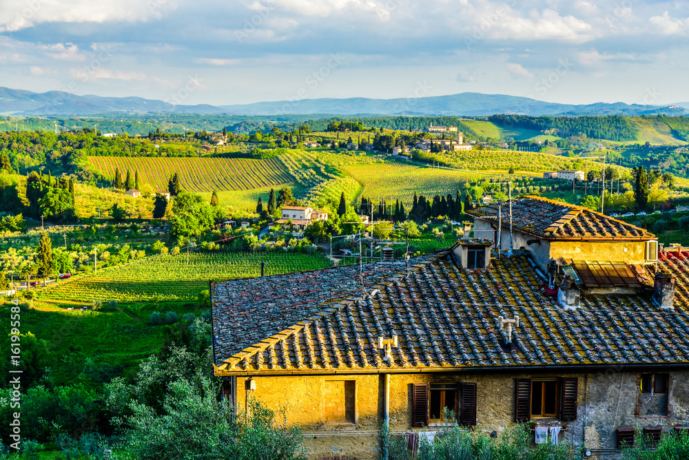Sunset and houses in Tuscany