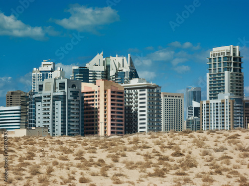  Midday heat in the desert in the background buildingsl on Nov 17, 2012 in Dubai UAE photo