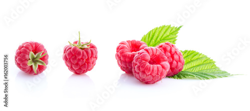 three raspberry isolated on white.
