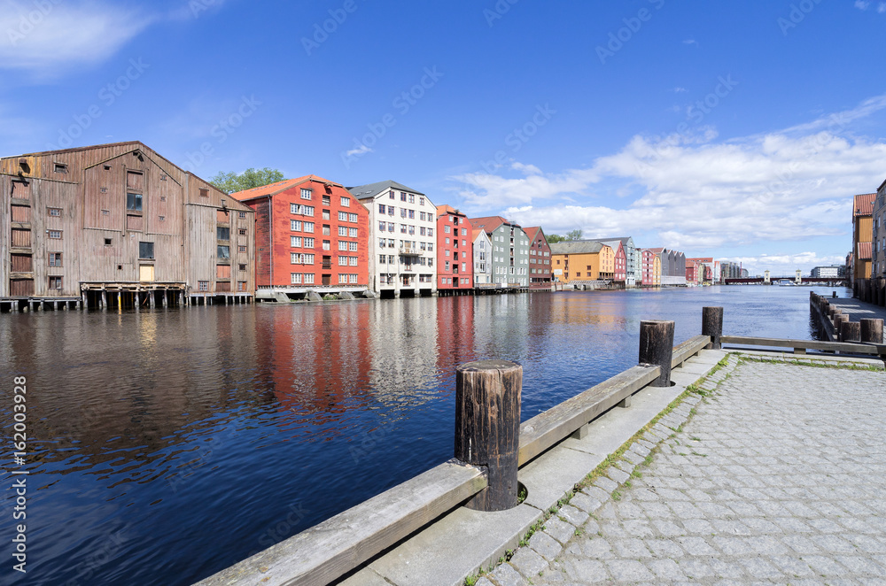old storehouses flanking the river Nidelva in Trondheim, Norway