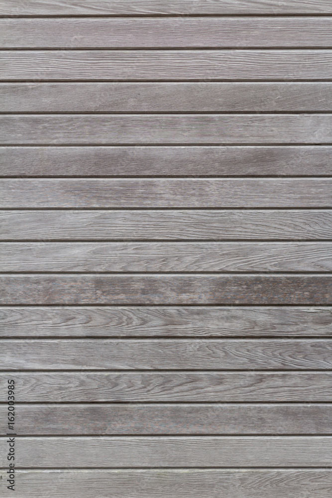 Weathered wood texture with natural patterns, vertical, backgrou Weathered wood texture with natural patterns, vertical, backgrou