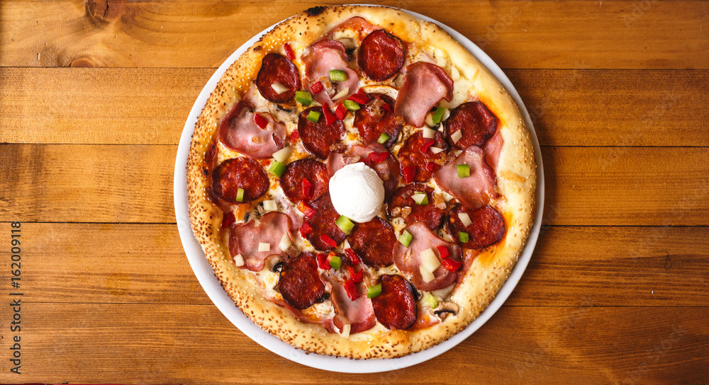 Pizza with various toppings Pizza with various toppings