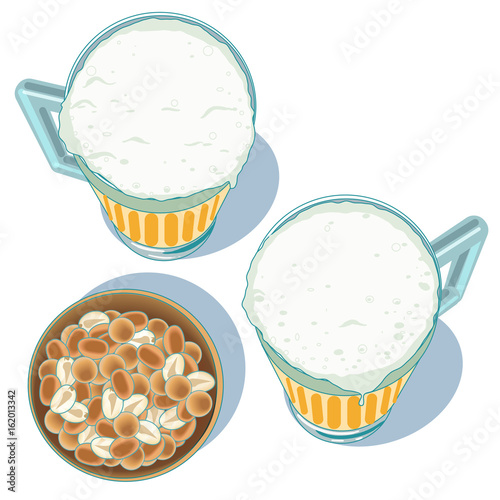 Two mugs of beer with a bowl of nuts or peanuts, viewed from above.
