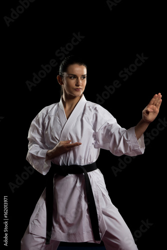 Karate Fighter Isolated On Black Background