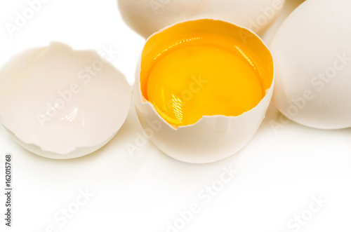 fresh eggs on the black background photo