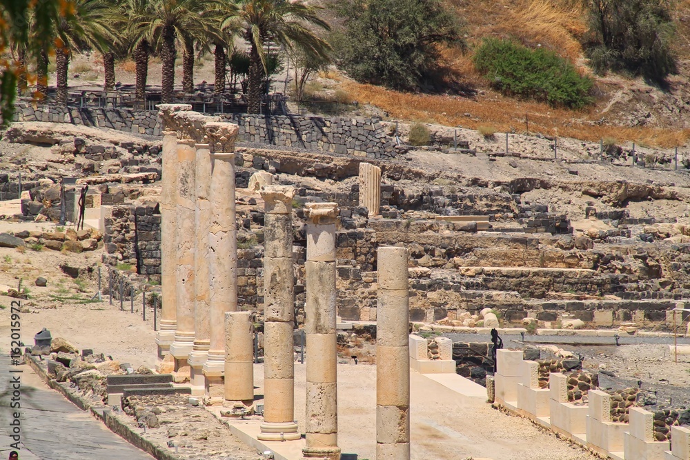 Archaeological ruins, including standing columns, of ancient city of Beit She'an located in Galilee region of Israel