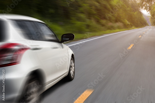 movement car speed on the road rural view background