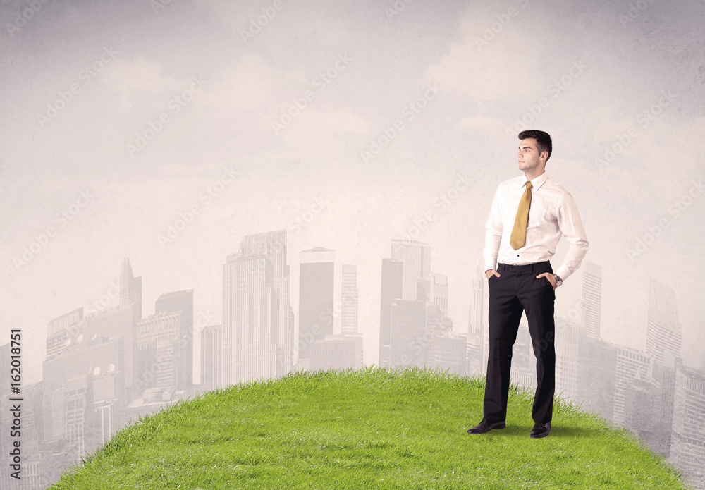 man standing in front of city landscape man standing in front of city landscape