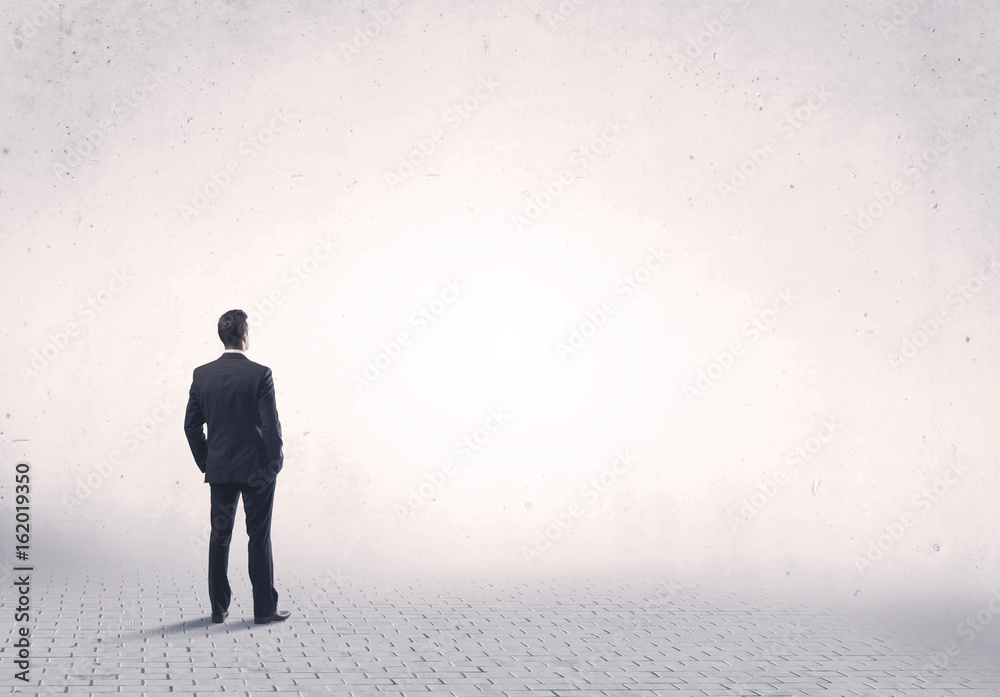 Elegant person standing with his back Elegant person standing with his back