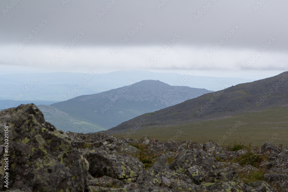 Panoramic view of the mountains and cliffs, South Ural. Summer in the mountains. Travel. Panoramic view of the mountains and cliffs, South Ural. Summer in the mountains. Travel.