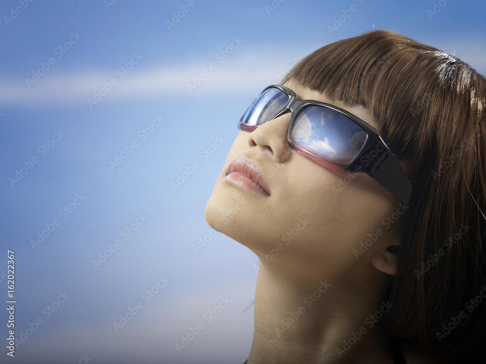 close up of a woman face with sun glass close up of a woman face with sun glass