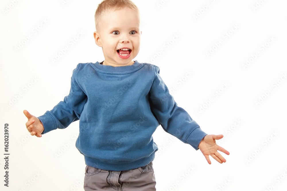 Happy boy laughing showing white teeth, a child expressing emotions, Happy boy laughing showing white teeth, a child expressing emotions,