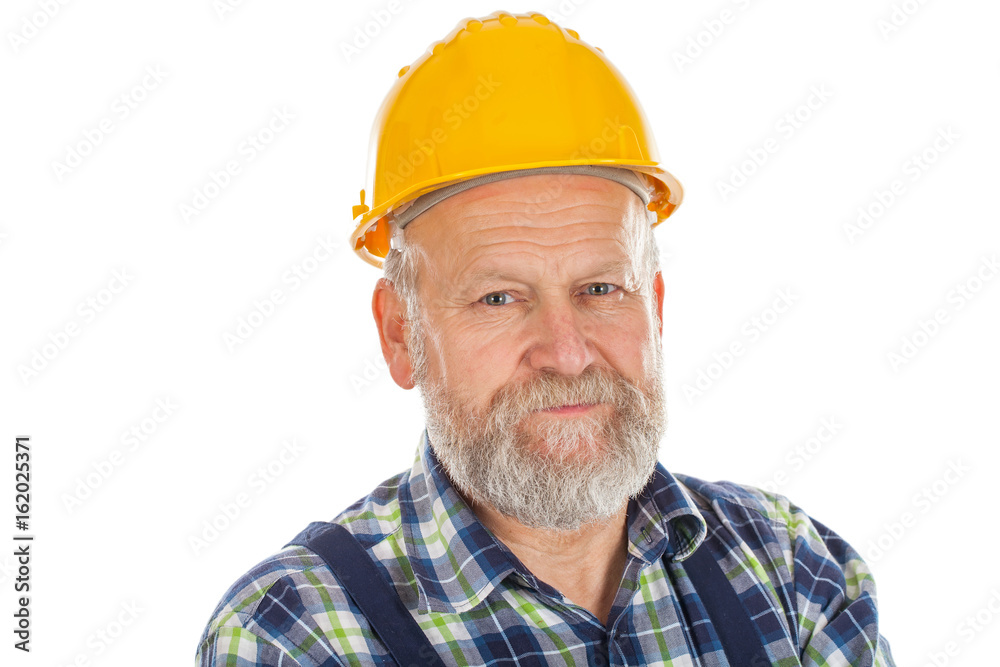 Elderly builder holding utensils Elderly builder holding utensils