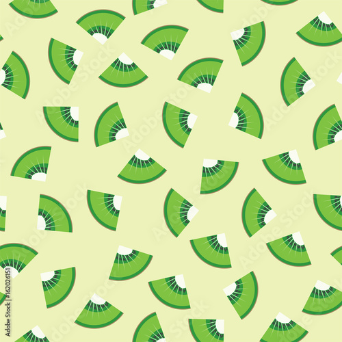 Kiwi fruit graphic design sliced in triangle pieces and arranged into seamless pattern background.